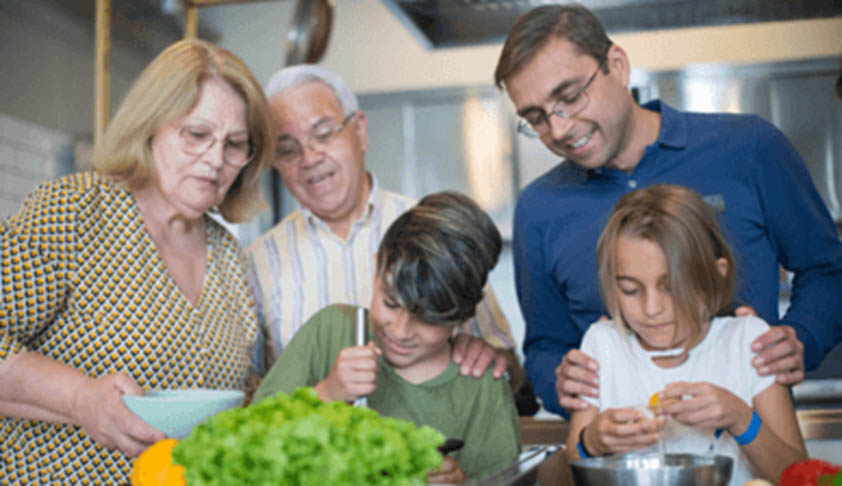 Picture of family prepping food together